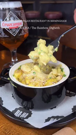 Vibrant vegan dishes at BA-HA in Digbeth, Birmingham, including Royale With Cheese and Tiramisu, redefine dining.