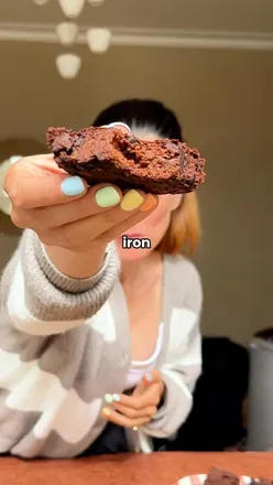 High-protein sweet potato brownie loaf, perfect autumn treat, made with peanut butter and dark chocolate chips.