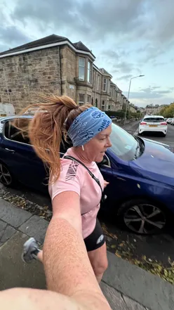 Runner enjoying early morning miles on quiet streets, transitioning to aerial yoga training for day two.