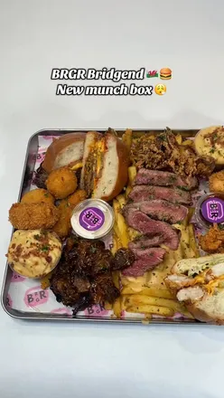 Alt text: "New Munch Box at BRGR Bridgend featuring gourmet burgers, crispy chicken, and cheesy arancini bites.