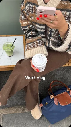 Social media marketing day featuring matcha, a sandwich, and stylish outfit in a cozy setting.