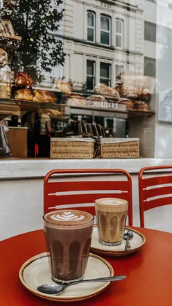 Cosy cafe ambiance at 101 Westbourne Grove, perfect for people-watching this Autumn in London.