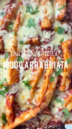 Golden-baked cassava with Indian-spiced arrabbiata sauce and melted cheese, perfect for Diwali gatherings.