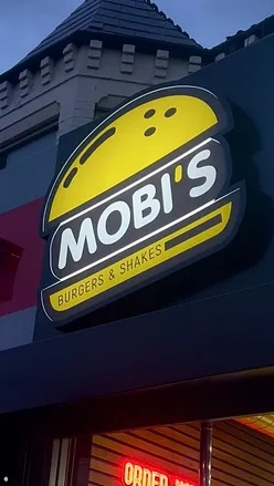 Delicious Messi and Fiery Ringo burgers with loaded fries at Mobi's Burgers in Middlesbrough, perfect for food lovers!