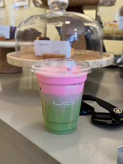Refreshing Rose Cloud Iced Matcha drink served at Koub café in London, perfect for matcha lovers.