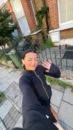 Participants at Run Club Tour Stop 3 enjoying a coffee run at Clapham Common with Nadia, promoting community and fitness.