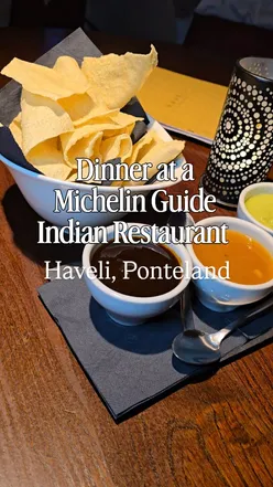 Delicious Aloo Tikki Chat and cocktails at Haveli Ponteland, showcasing diverse vegetarian Indian cuisine.