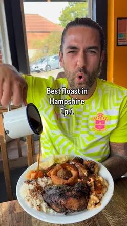 Delicious jerk roast dinner at Soca Shack, Southampton, featuring rice and peas for the perfect Sunday feast.