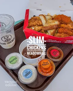 Delicious meal from Slim Chickens in Meadowhall, Sheffield, featuring chicken tenders, wings, fries, and a caramel milkshake.