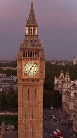Big Ben illuminated at night in London, showcasing the city's iconic skyline and vibrant nightlife.