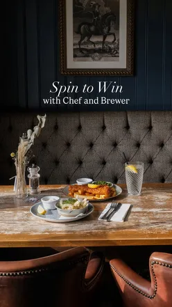 Enjoying a free drink at Bulls Head pub while working, thanks to Greene King's Spin to Win loyalty app feature.