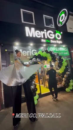 Guests enjoying lemon & herb chicken, burgers, and drinks at the grand opening of Merigo in Walsall.