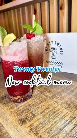 Refreshing cocktails at Twenty Twenty, Newcastle, featuring unique flavors and cozy interior for sipping and snacking.