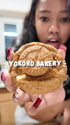 'Indulging in a Lotus Biscoff cookie from Yokoro Bakery in London, showcasing its deliciousness and unique flavor.'