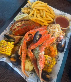 Fresh seafood feast at Sapphire Leicester’s grand reopening, featuring calamari, dynamite prawns, and a mixed boil.