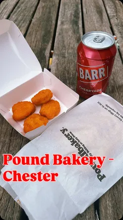 Close-up of delicious chicken nuggets on a plate, humorously referencing Jamie Oliver.