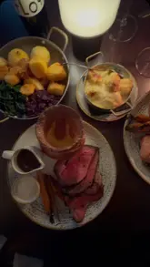 Delicious roast dinner served at Pearly Cow, Brighton, featuring stunning flavors and seaside ambiance.