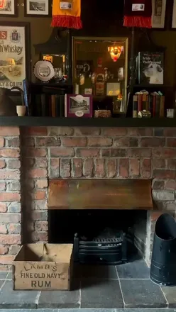 Guests enjoying whiskey tastings at Ireland's first destination whiskey hotel, The Harbourview Hotel in Carnlough.