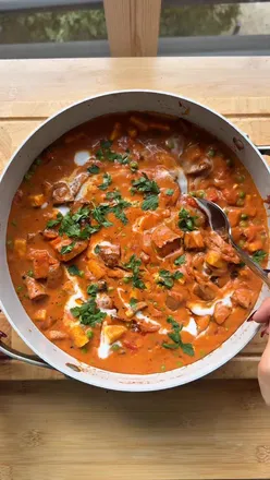 Delicious roasted sweet potato and paneer curry served over rice, perfect for budget-friendly vegetarian meals.