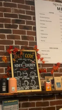 Iced mocha and pumpkin matcha with cookies at Sips & Stories' new autumn menu in Liverpool.