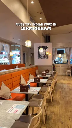 Enjoying vibrant Indian cuisine at Indico Street Kitchen in Solihull, featuring Punjabi samosa chaat and butter chicken.