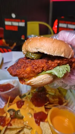 Students enjoy Wingtrapp's exclusive student lock-in menu featuring burgers, nachos, and shakes in Leicester.