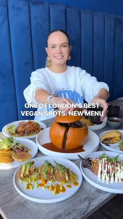 Vegan Caribbean dishes from @jam.delish in London, featuring stuffed pumpkin and jerk aubergine on a cozy autumn menu.