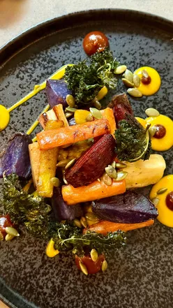 Dining at Angels Food on the Royal Mile, enjoying seasonal dishes in a cosy, minimalist Scottish restaurant.