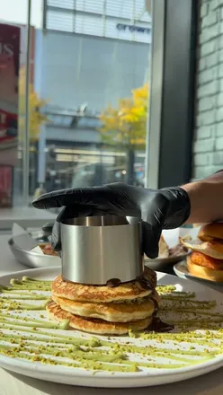 Delicious breakfast at @thecreperieco in Manchester featuring Desi breakfast, Hash Shuka Bun, and Kunafa Pancake Stack.