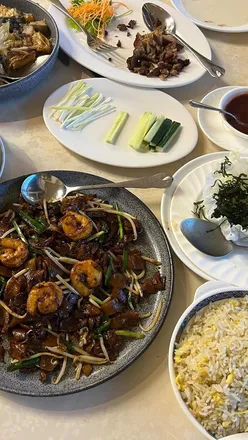 Enjoying a Chinese feast at Dragon's Delicacy in Eastville, Bristol with generous portions and bold flavors.