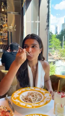 Barbarella in Canary Wharf showcasing retro decor, delicious Italian dishes, and vibrant dining vibes.