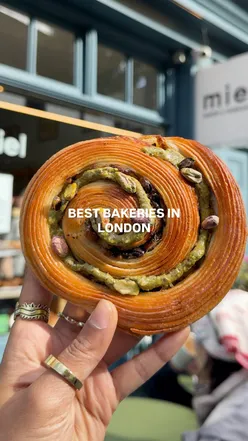 Exploring diverse pastries during a London bakery crawl, showcasing unique twists on classic treats.