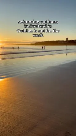 Visitors enjoying the Wild Scottish Sauna in St Andrews after a beach dip, near the Old Course Hotel.