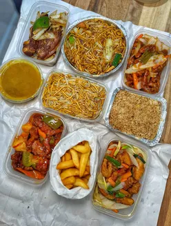 Feast of delicious Chinese dishes including honey chilli chicken, crispy beef, and Peking chicken at Wing Chau, North Shields.