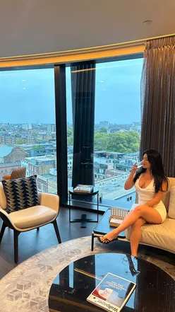 Enjoying a luxurious staycation at Artotel London Hoxton with skyline views, spa, and rooftop dining.