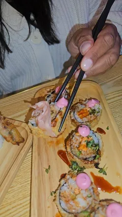 Dining experience at Maki Ramen in Leicester City Centre featuring sushi, ramen, and inviting ambiance.