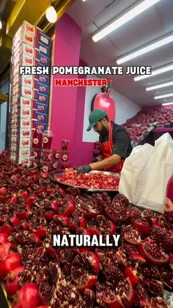 Fresh pomegranate juice served in Manchester, showcasing vibrant colors and a refreshing drink option.