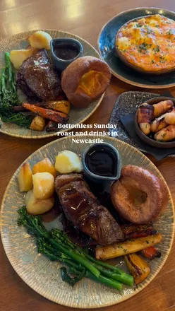 Bottomless Sunday roast at Banyan UK featuring beef, Yorkshire puddings, and unlimited drinks in Newcastle.