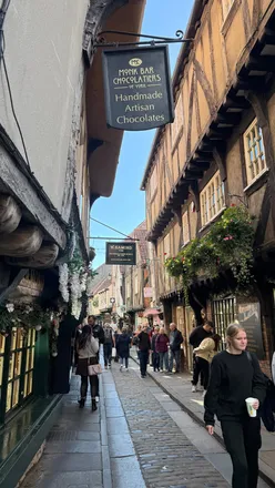'Cozy autumn day in York enjoying breakfast at Bettys and walking through The Shambles, perfect seasonal getaway!'