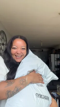 Excited fitness enthusiast showcases Gymshark gifting, seeking feedback on try-on haul for inclusive sizing.