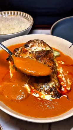 Enjoying butter chicken and string hoppers at Raaz Putney, an upcoming Indian restaurant in South West London.