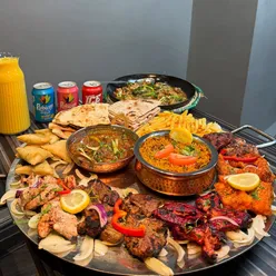 Delicious Punjabi Tawa and desserts enjoyed at Sultans in Walsall, praised for amazing hospitality and flavorful dishes.