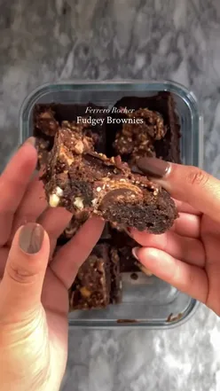 Delicious one-bowl fudgey brownies topped with crushed Ferrero Rocher, perfect for chocolate lovers!