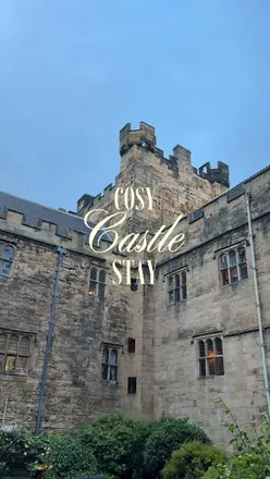 Guests enjoying a fairytale stay at Lumley Castle with candlelit dining and historical charm in County Durham.