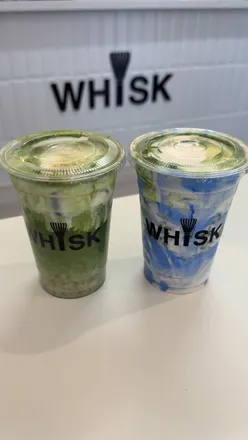 Blue Coconut Cloud and Cinnamon Roll Matcha at Whisk Leicester's new café showcasing vibrant matcha drinks.
