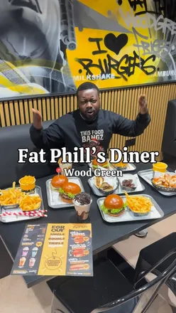 Behind the scenes at Fat Phil's Diner, showcasing juicy burgers and Philly cheese steaks in Amsterdam. #FatPhilsDiner