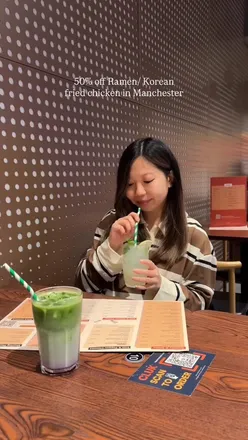 Feasting on ramen, Korean fried chicken, duck baos, and tofu at Cluk in Manchester, perfect for a cozy winter meal!