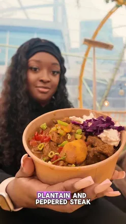 Jerk Vibes sign at Canteen Food Hall in North Greenwich, showcasing Caribbean cuisine and vibrant food culture.