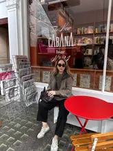 Stylish friends enjoying a perfect London day at Hush, showcasing casual fashion and friendship.