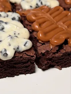 Delicious Lotus Biscoff and Cookies & Cream brownies from Bakee House Co, showcasing chocolatey indulgence.